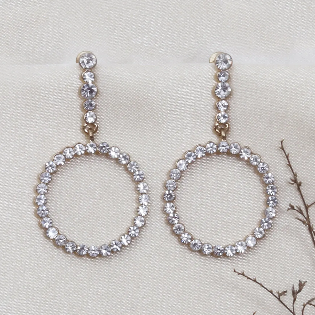 CONTEMPORARY CIRCULAR DIAMANTE DROP EARRINGS