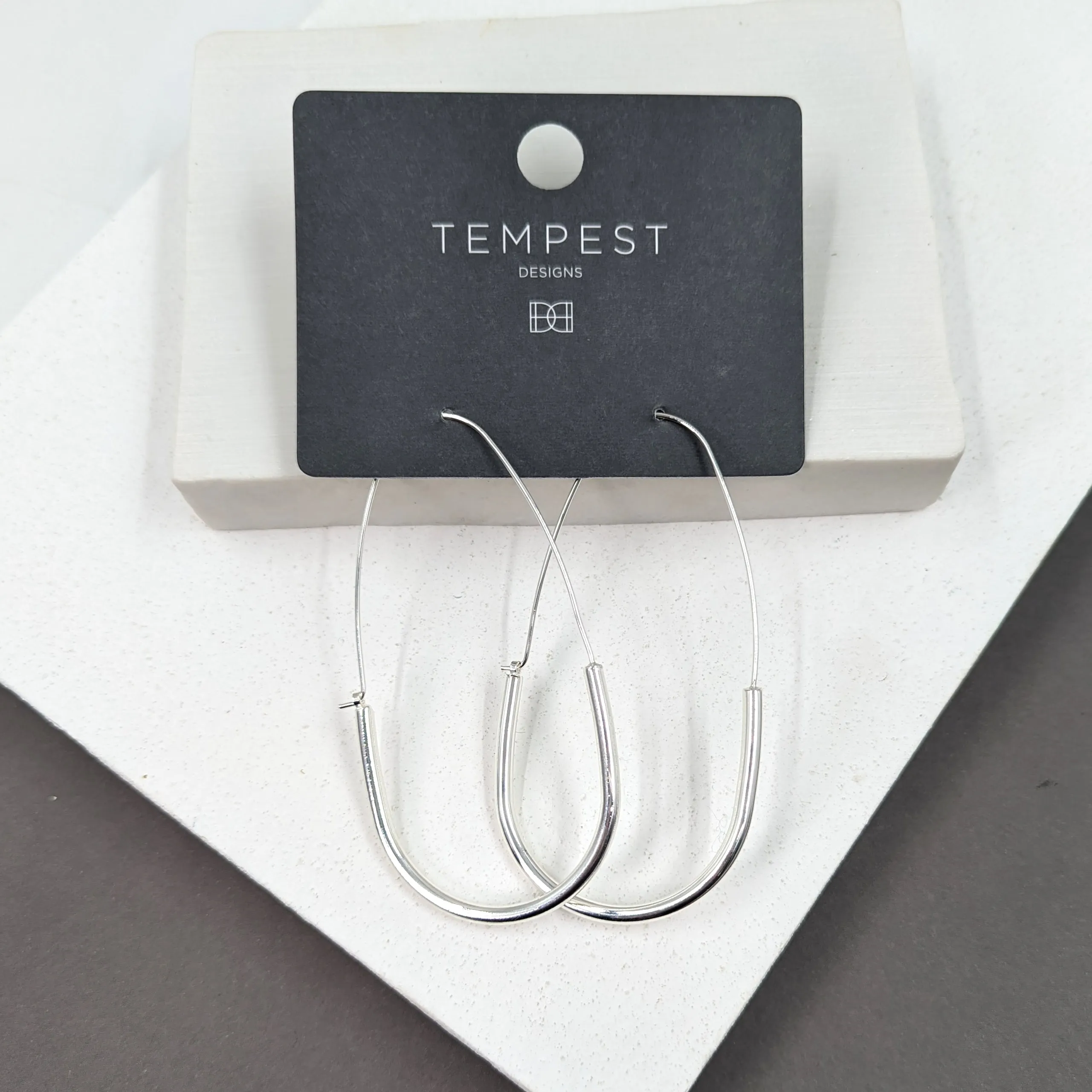 Contemporary elongated hoop earrings