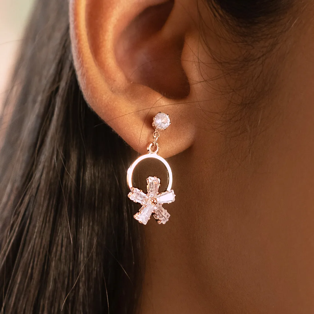 CONTEMPORARY RHINESTONE STUDDED ROSE-GOLD TONED FLOWER DROP EARRINGS