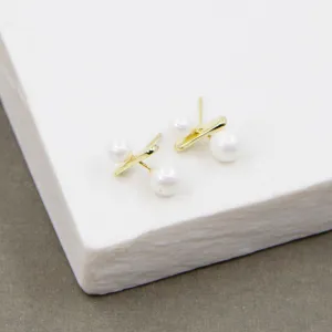 Double pearl and contemporary bar stud earrings