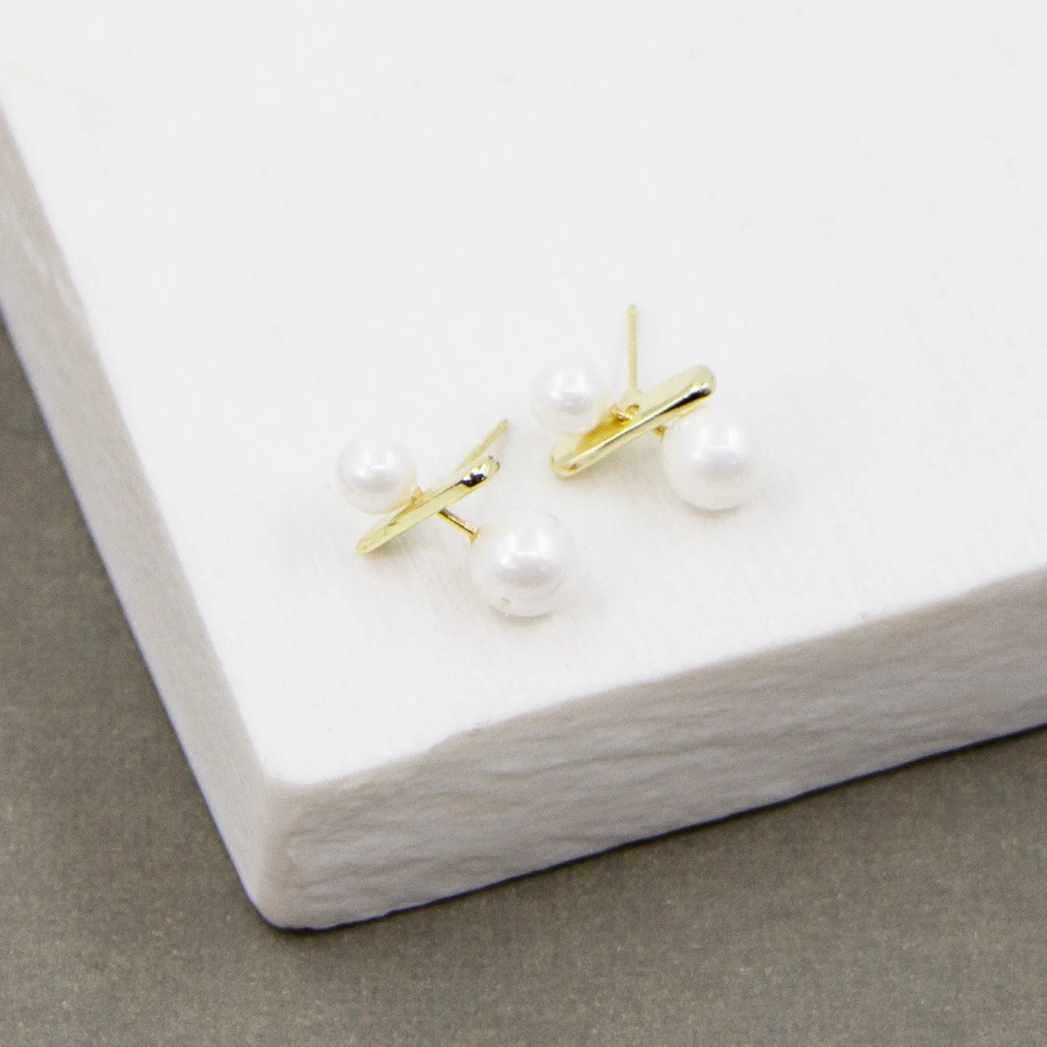 Double pearl and contemporary bar stud earrings