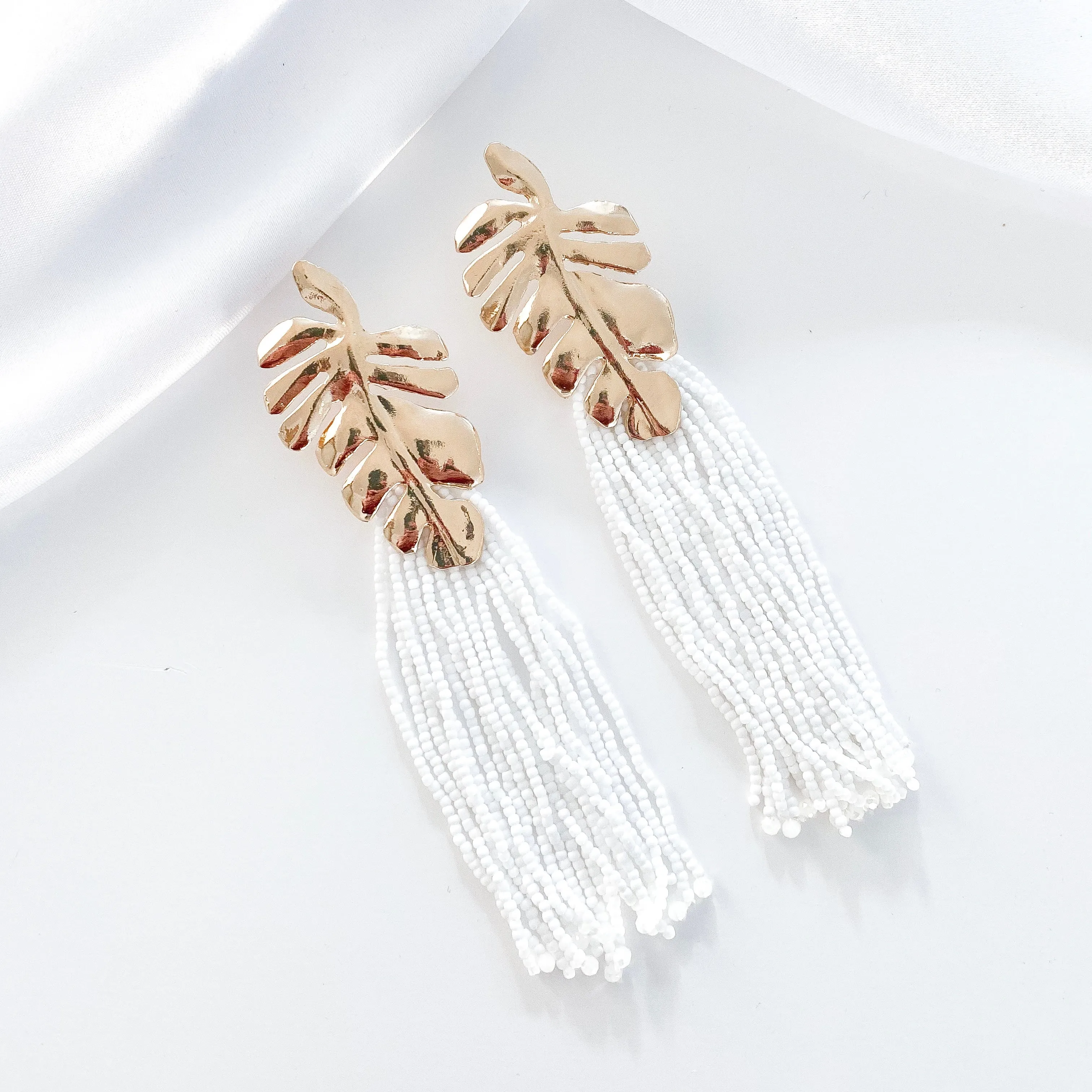 Gold Leaf and White Tassle Earrings