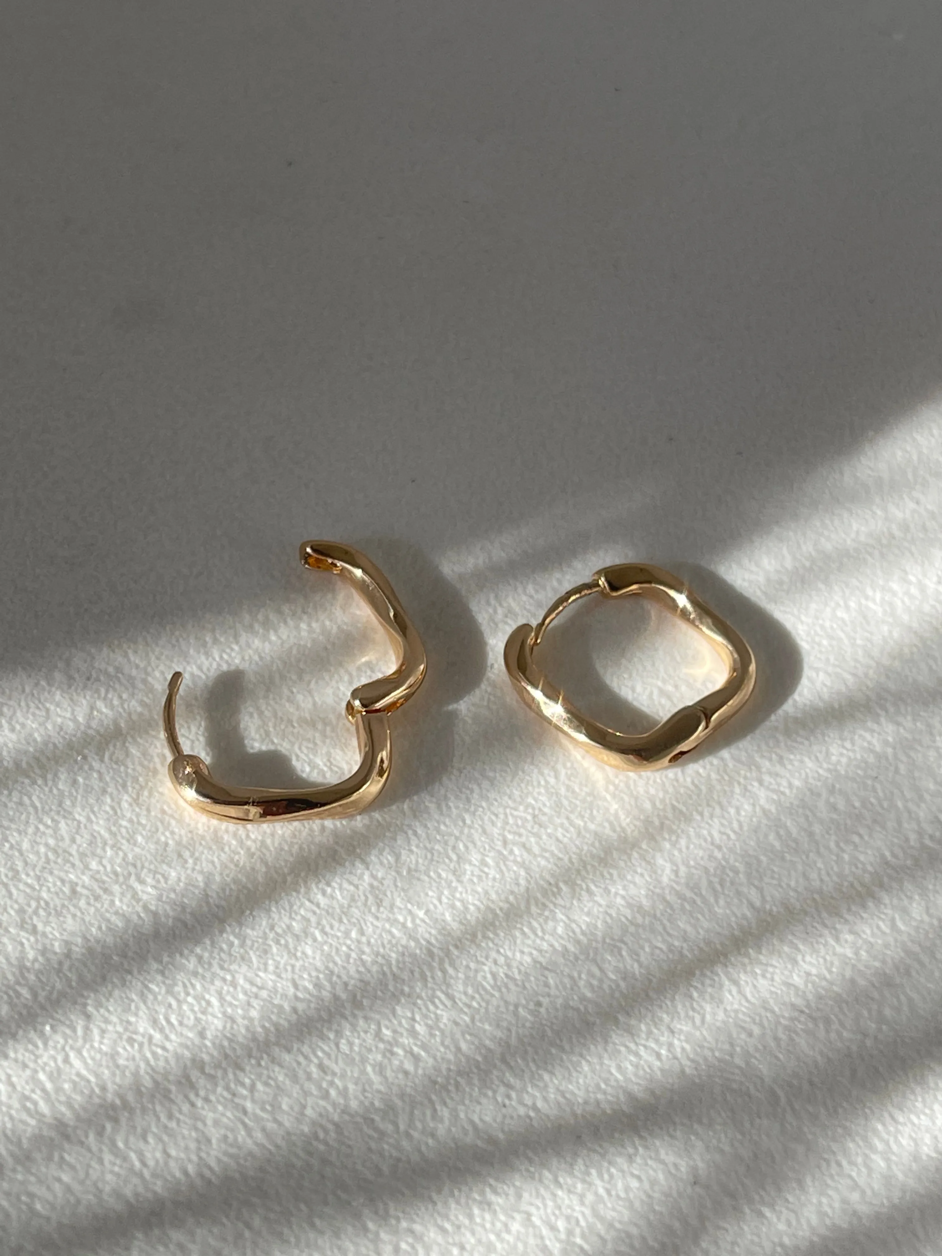 Kirsten Twist Stainless Steel Hug Hoop Earring In Gold