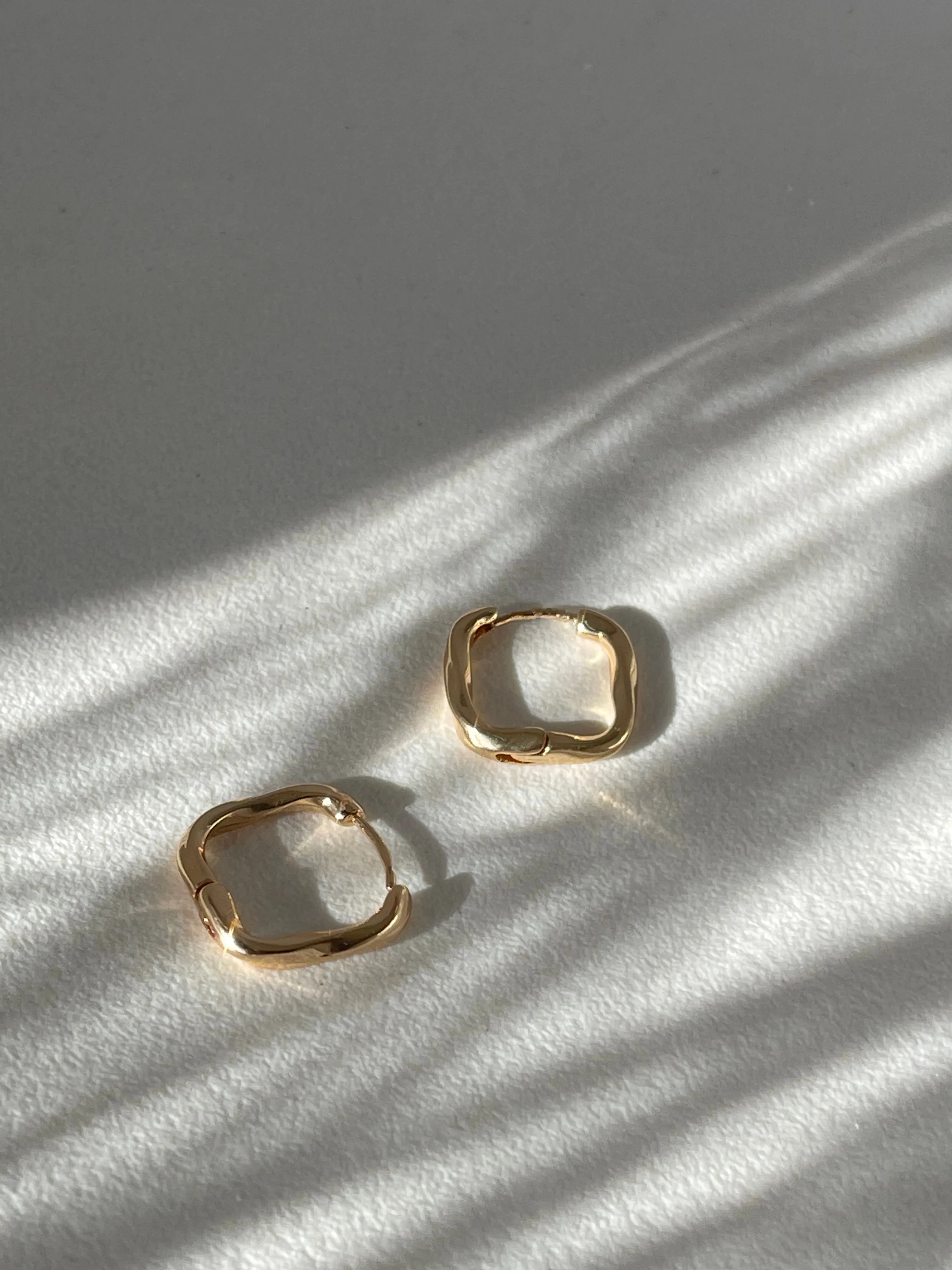 Kirsten Twist Stainless Steel Hug Hoop Earring In Gold