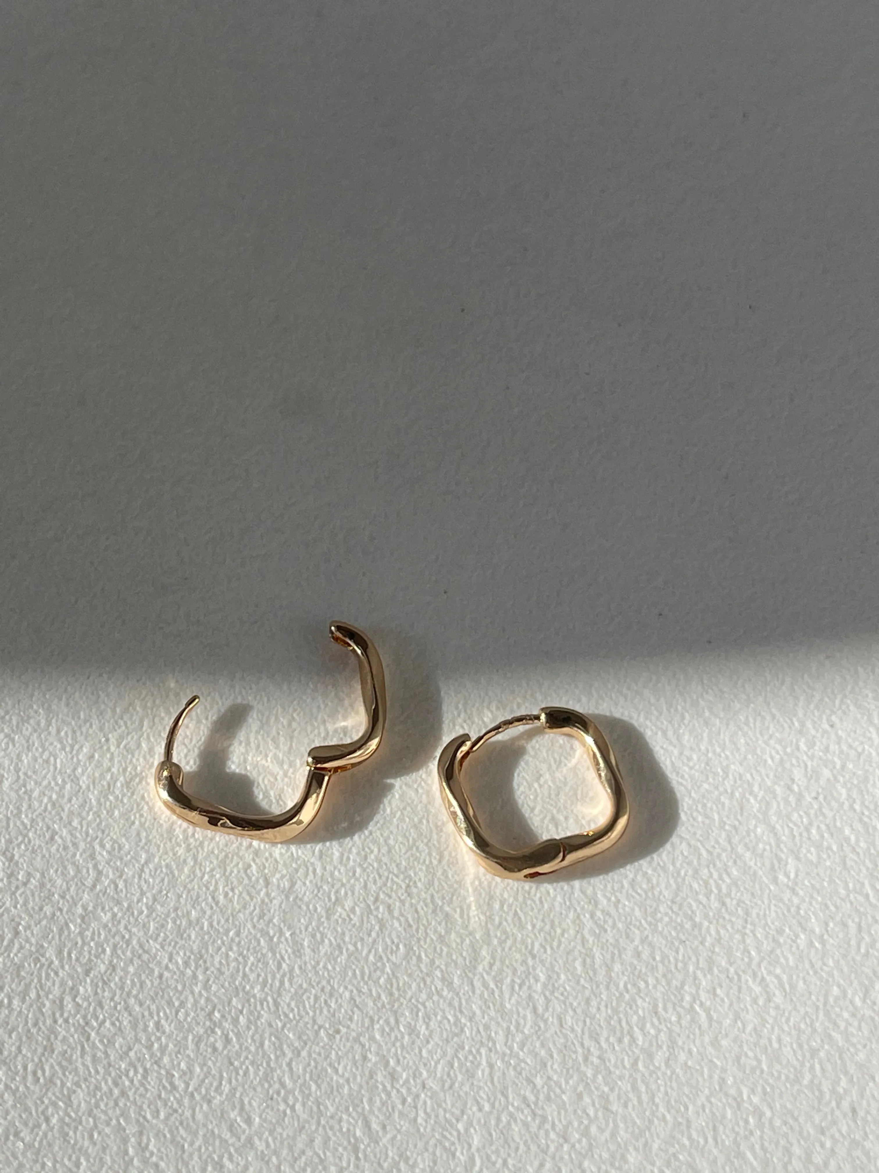 Kirsten Twist Stainless Steel Hug Hoop Earring In Gold