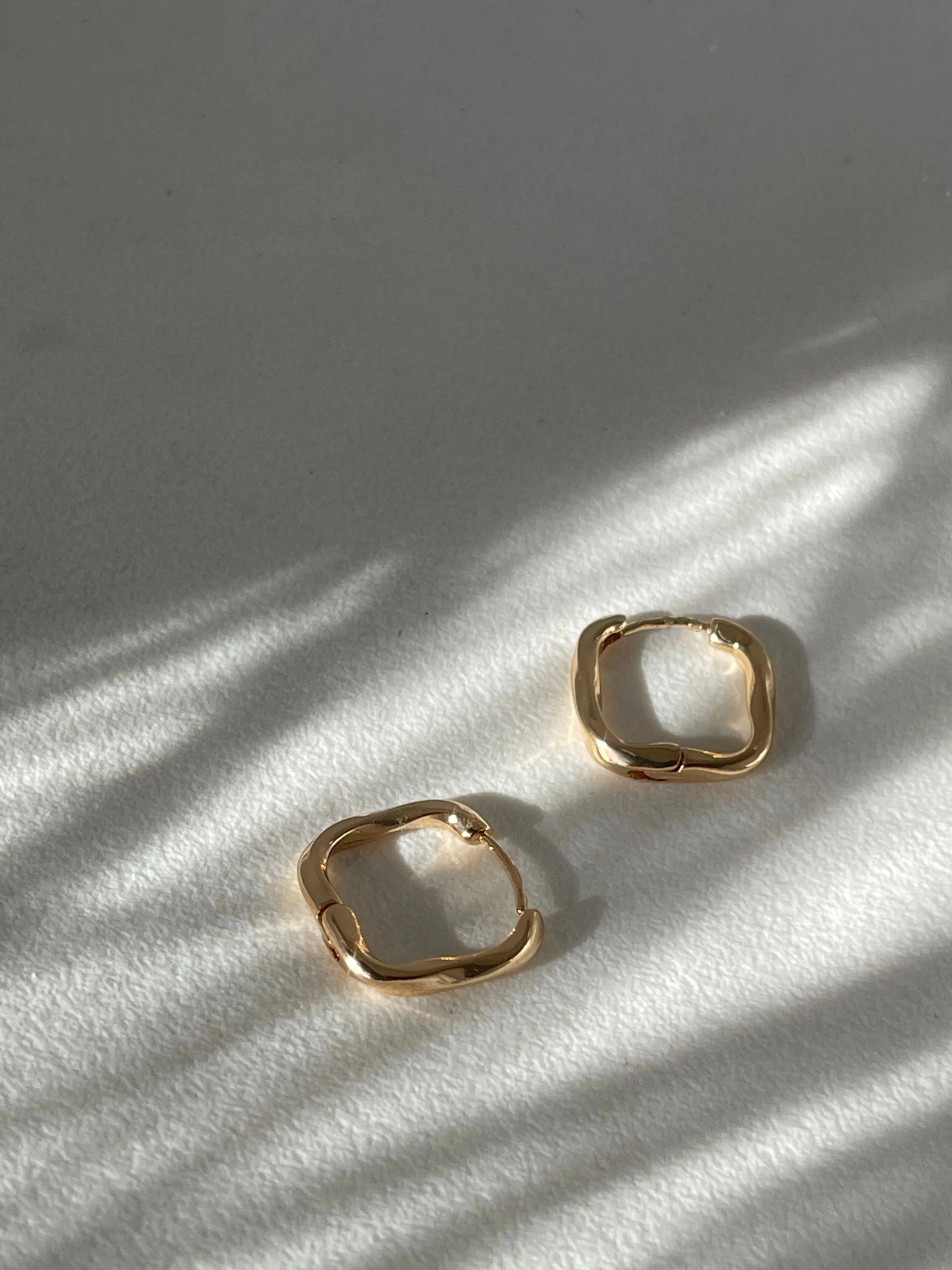 Kirsten Twist Stainless Steel Hug Hoop Earring In Gold