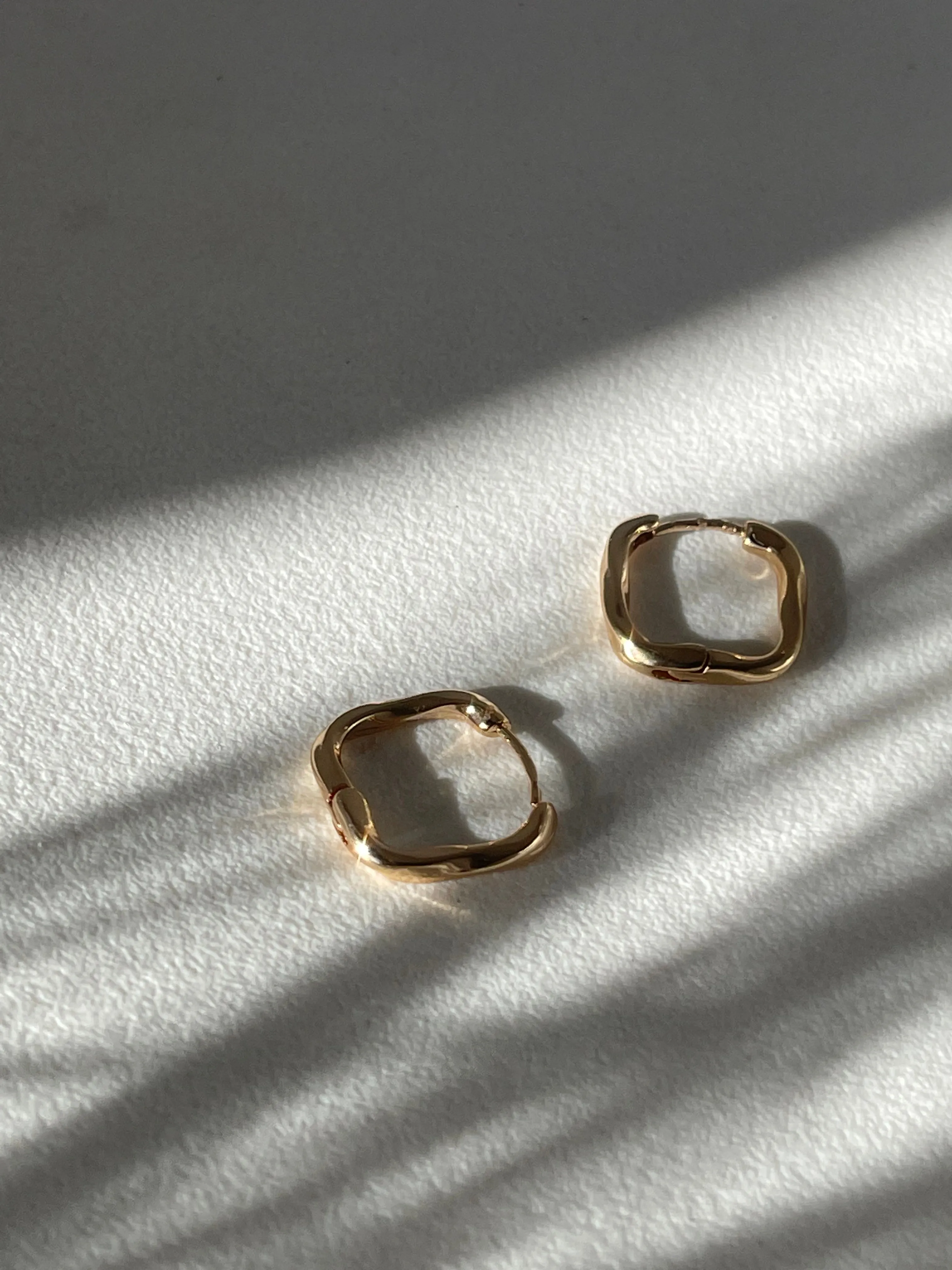 Kirsten Twist Stainless Steel Hug Hoop Earring In Gold