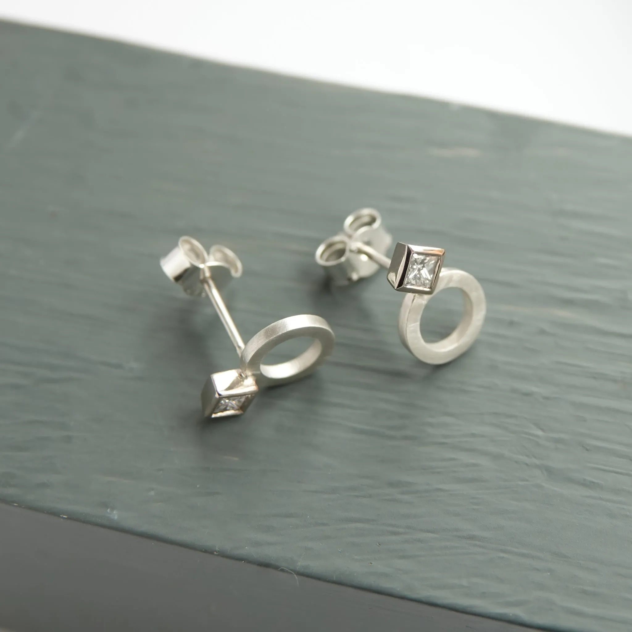 Silver and 18ct white gold diamond contemporary earrings